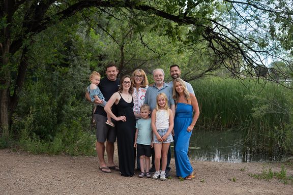 Extended family gathered together for outdoor family portraits in Colorado Springs