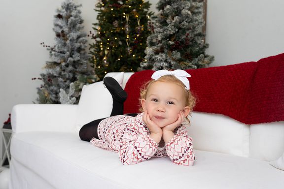 6. Bottom right — Little girl in christmas outfit 