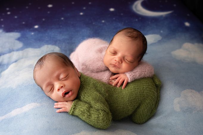 Sleeping newborn twins photographed during a professional newborn session in Colorado Springs.
