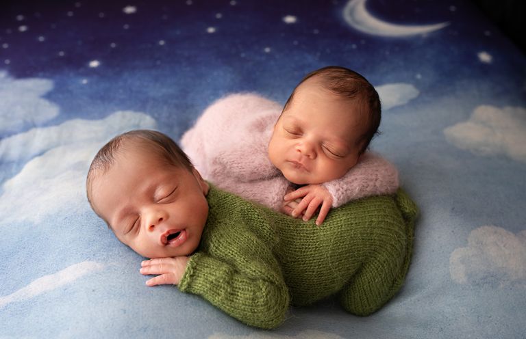 Newborn twins sleeping together during a studio newborn photography session in Colorado Springs