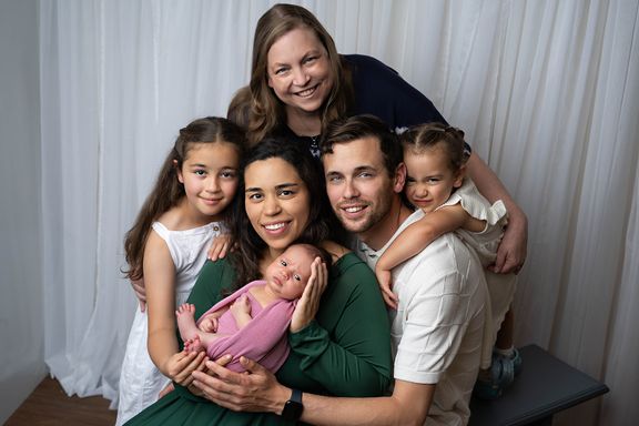 extended family image with grandma holding baby 