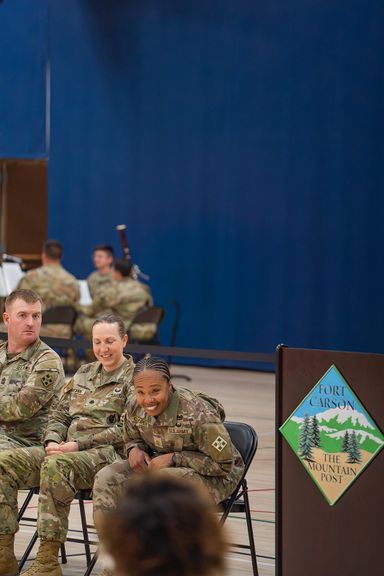 Service members celebrating together after returning home from deployment