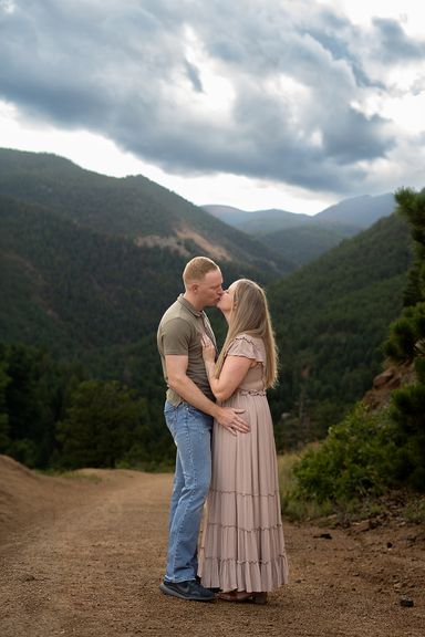 Couple embracing with a mountain view during a Colorado Springs photography session