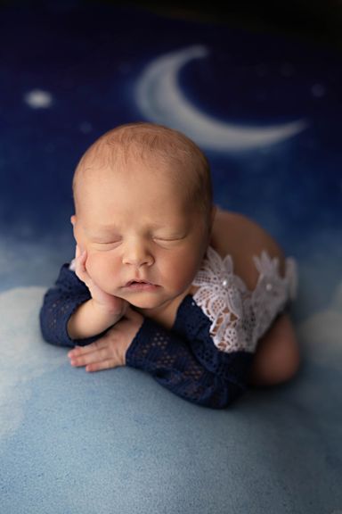 Sleeping newborn baby posed during a Colorado Springs newborn photography session
