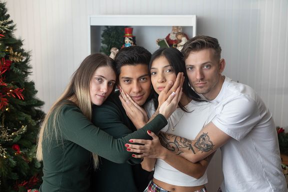 Funny, nostalgic JCPenney-style Christmas portraits featuring intentionally awkward poses and retro holiday photography.